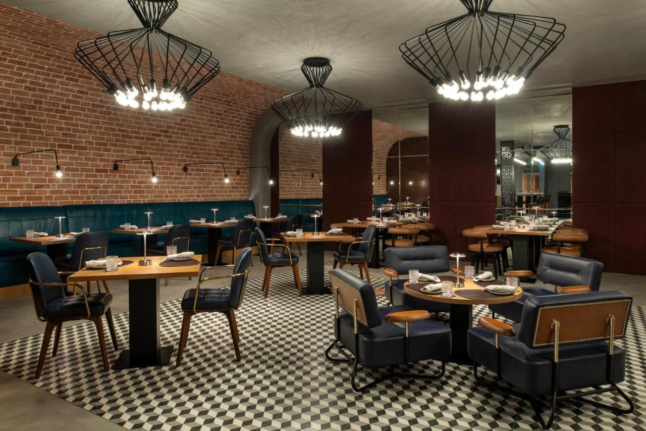 Abesq Doha Hotel And Residences, An Ihg Hotel المظهر الخارجي الصورة The interior of the restaurant